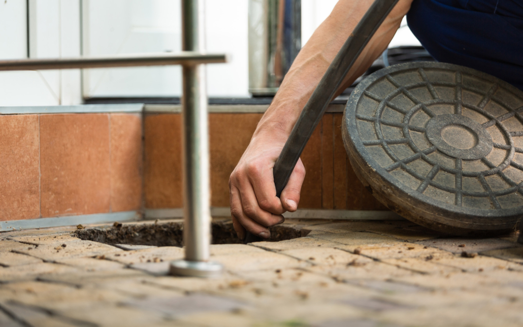 Worker performs the installation of pumping equipment