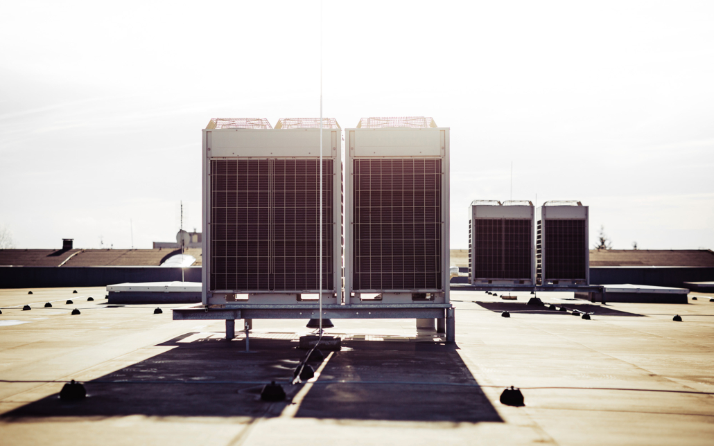Air vents on the roof of building in functional and operational condition